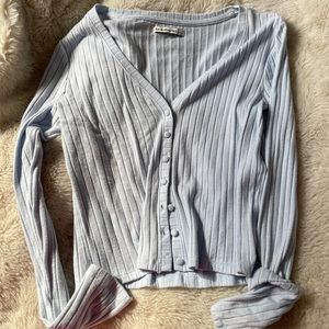 Light blue button up light sweater
